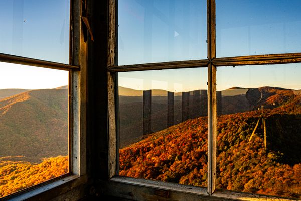Mountainous Reflections in Shuckstack Fire Tower thumbnail