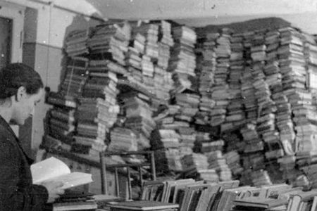 The Einsatzstab Reichsleiter Rosenberg looted books across occupied Europe. Pictured here is a room full of stolen texts in Riga, Latvia.