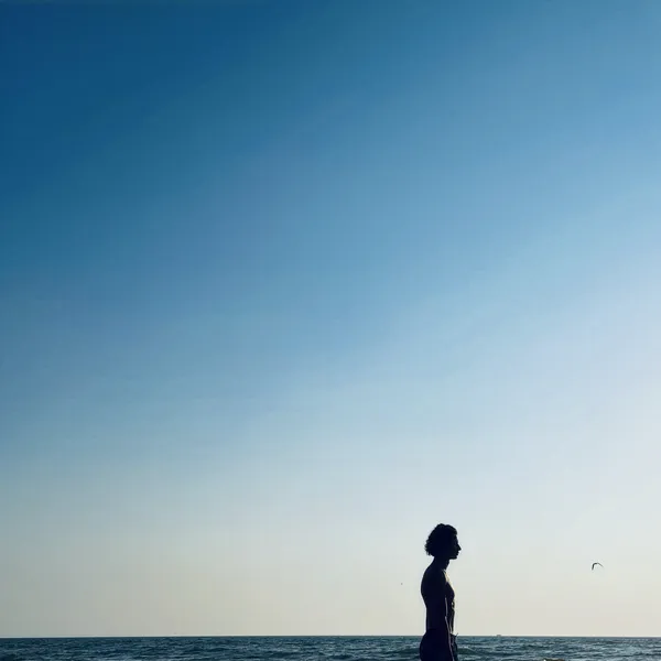 Profile walking on the beach thumbnail