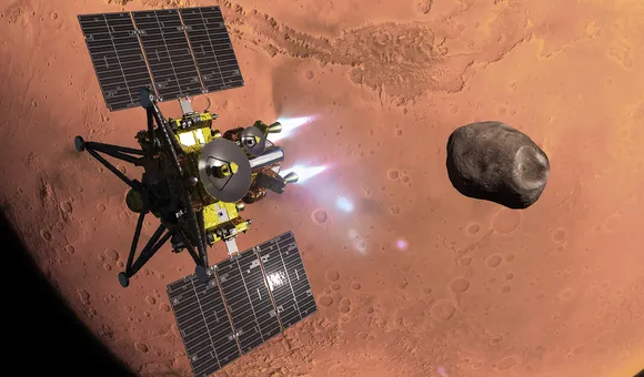 A digital art illustration of the gold and black spacecraft firing its white thrusters to maneuver near a dark, rocky moon, with the reddish surface of Mars visible in the background.