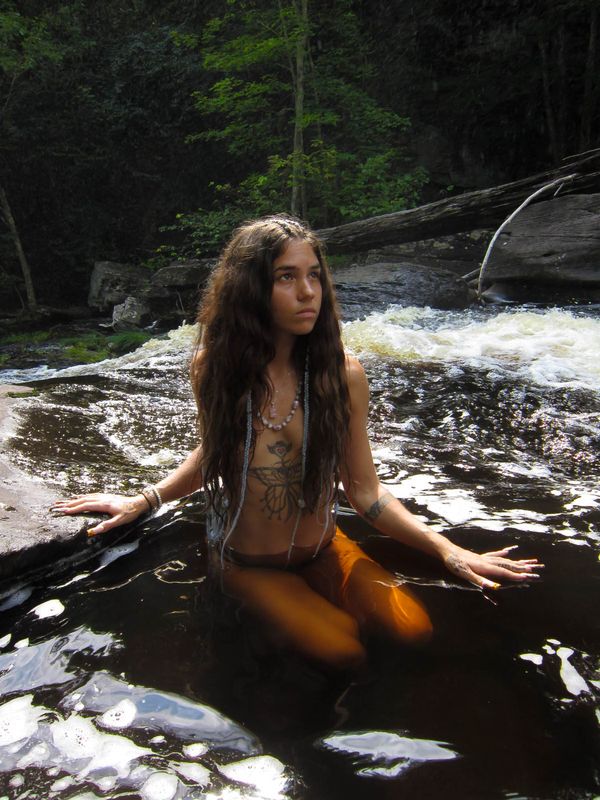 Thea Sitting in a Waterfall thumbnail