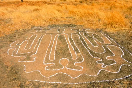 One of the human figures depicted in the newly documented petroglyphs
