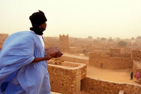 Mohamed Mahmoud on the roof of his Al-Hamoni family library, of which he is curator, in Chinguetti, Mauritania.
