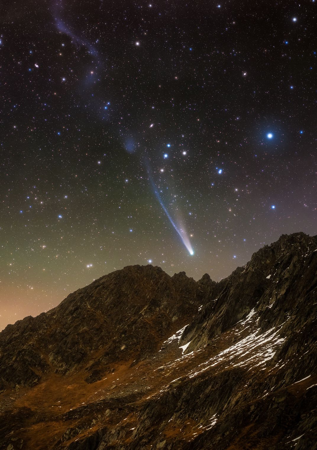 Comet racing toward a mountain