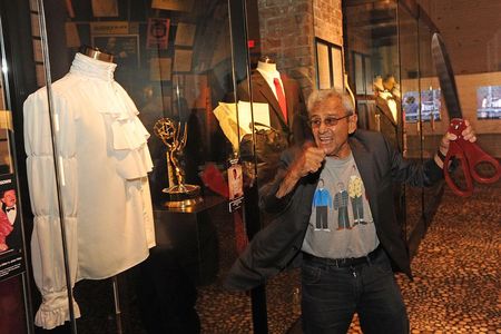 George Shapiro cuts the ribbon on a Seinfeld exhibit.