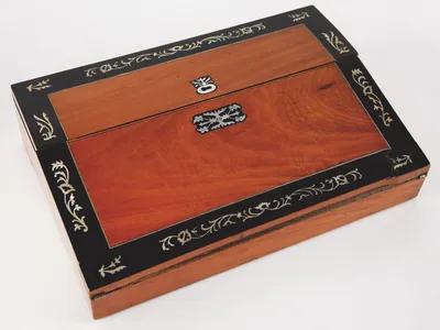 You Can Buy Novelist Charles Dickens' Personal Travel Writing Desk and Silverware Set image