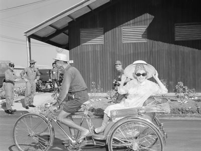 Phyllis Diller arrives at Korat Air Base, Thailand, with the Bob Hope Christmas show, 1966.