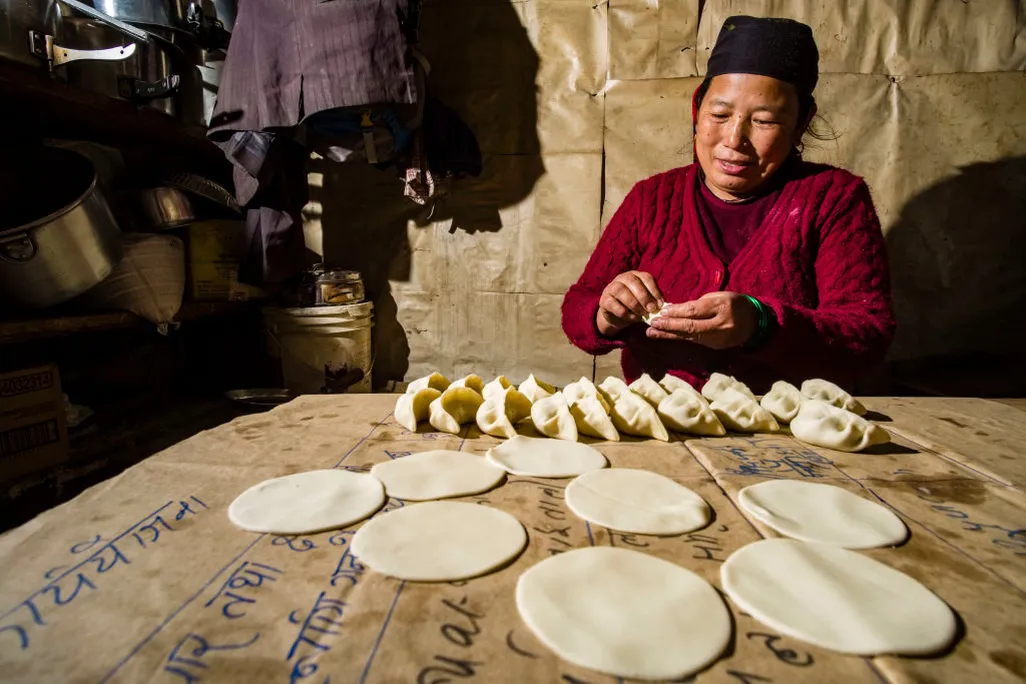 Nepali woman prepares momo