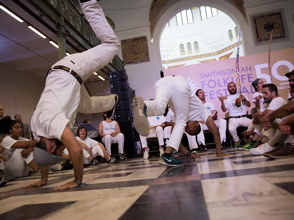 Capoeira roda in the Arts and Industries Building at the 2017 Folklife Festival.