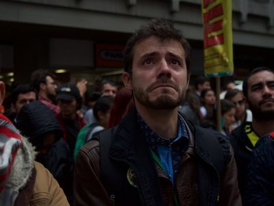 A Colombian man cries during a June 20 peace protest in Bogotá. 