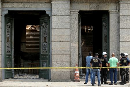 Federal police forensic specialists investigate the cause of the fire that tore through Brazil's National Museum in Rio de Janeiro.
