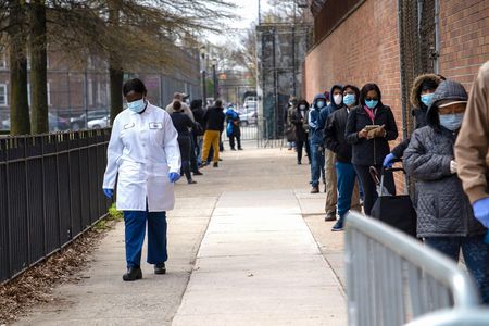 In April, people queued at a testing tent in East New York in Brooklyn. COVID-19 rates are highest among black New Yorkers in Kings County.
