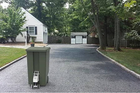SmartCan is essentially a pair of robotic wheels that are compatible with any municipal-issued trash receptacle.