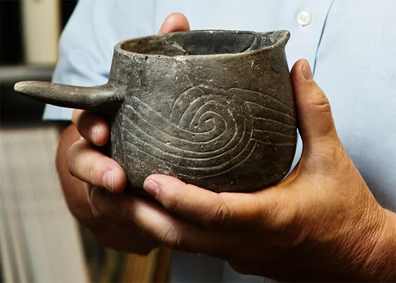 Pottery beakers were used to hold the “Black Drink”.