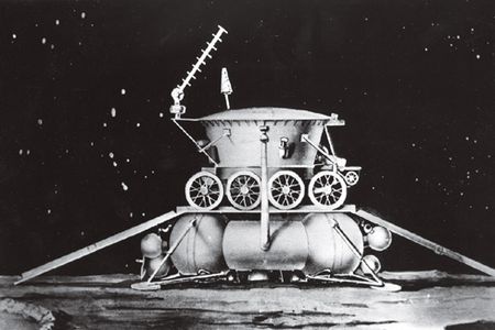 Artist's conception of the Lunokhod rover about to descend ramps from the landing module.