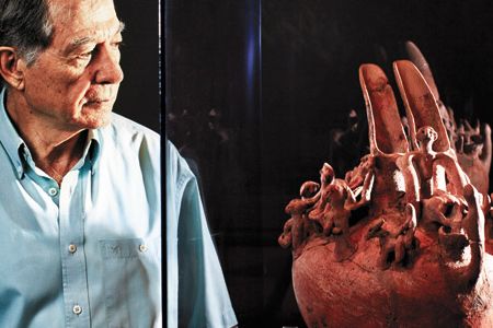 Cypriot archaeologist Sophocles Hadjisavvas, with a 2000 B.C. jug, handpicked each artifact to chronicle the 11,000-year history of Cyprus.