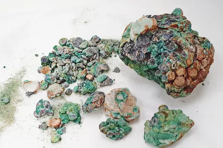 The metals oxidized over time, creating an enormous mass of coins.