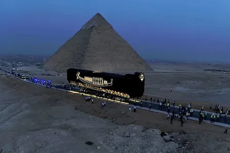 Experts transported the boat in a shock-absorbing metal container carried by a remote-controlled vehicle imported from Belgium.