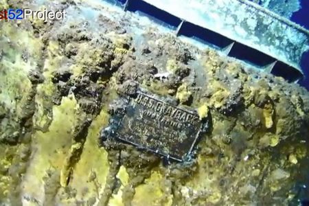 The submarine's plaque still bears its name.