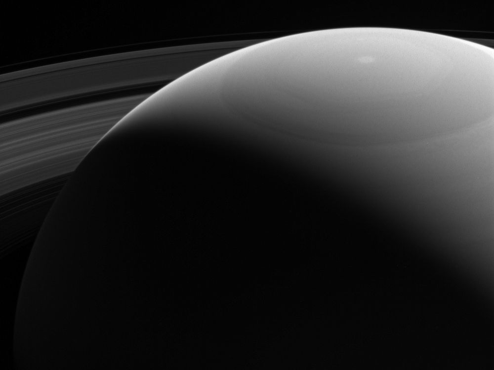 Peeking over saturn