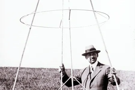 Goddard with his Hoopskirt rocket during a launch attempt in September 1928.