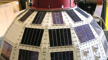 A backup duplicate of the original Telstar satellite, housed in storage at the National Air and Space Museum