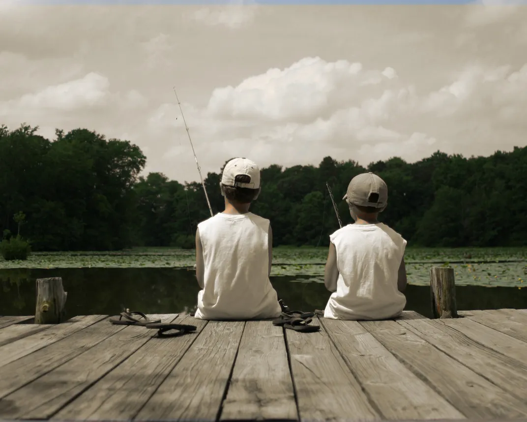 two boys fishing from a dock on a summer day, Smithsonian Photo Contest