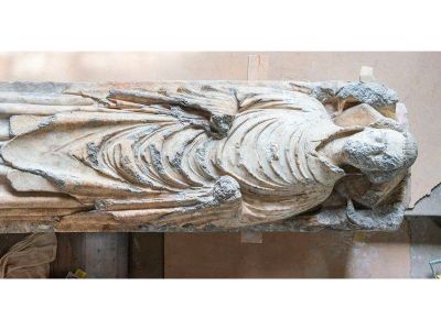 The statue, which dates back to around 1348, likely depicts John de Belton, a priest who died of the Black Death. 