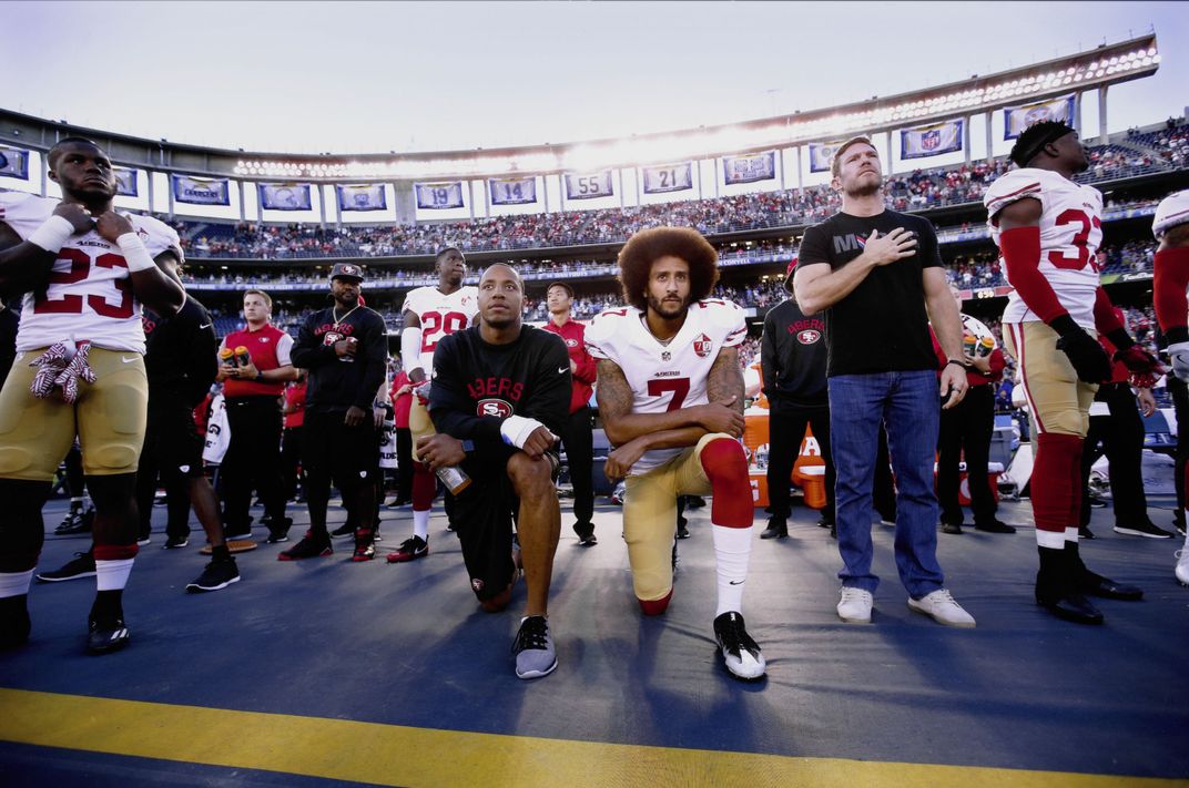 Eric Reid and Colin Kaepernick kneel