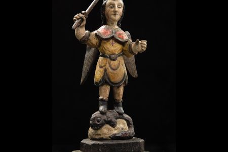 Carved wooden figure of San Miguel en Lucha con el Demonio