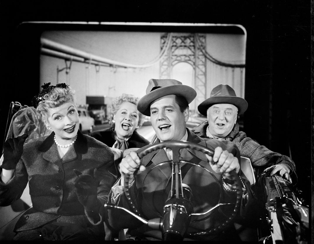 The cast of "I Love Lucy" in a car