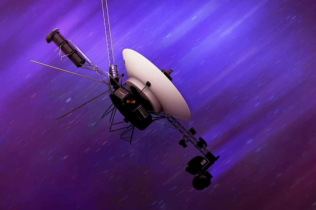 a spacecraft on a purpleish background