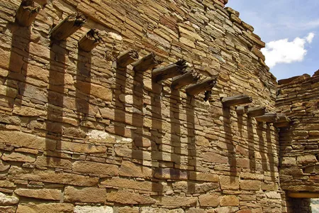 Timber beams extend through a wall of Pueblo Bonito, the largest of the Great Houses in Chaco Canyon.