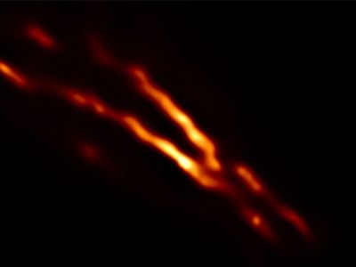 A new image of a powerful jet firing out of the black hole at the center of the radio galaxy Centaurus A, taken with the Event Horizon Telescope.