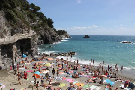 A crowded beach in Cinque Terre, Italy