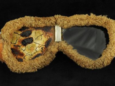 Pilot Eddie Gardner was wearing these goggles when he died in an airplane crash in 1921. Following another, earlier crash, he had made a point not to blame the airplane. He muttered "the ship was alright" while being carried to the hospital.