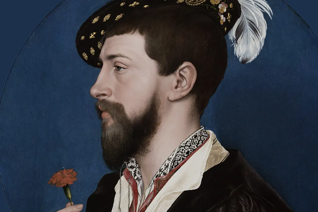 A circular portrait of a pale man with dark hair and beard, side profile, wearing a feathered hat and holding a red flower in one hand