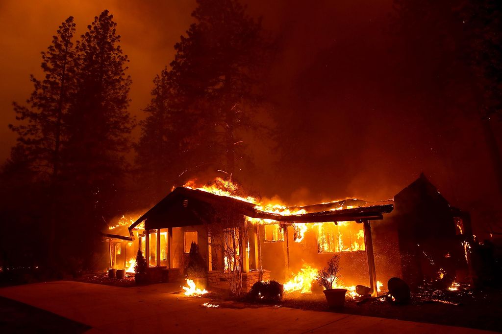 Wildfire engulfs house in California
