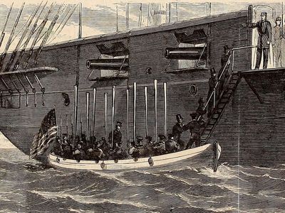 This illustration from the November 30 issue of Harper's Weekly depicts the two Confederate commissioners being brought aboard the San Jacinto after being removed from the RMS Trent.