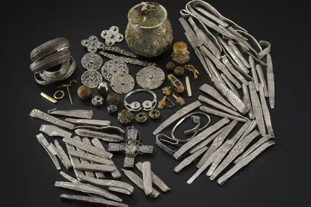 A metal detectorist discovered the Galloway Hoard in a ploughed field in Scotland in 2014.