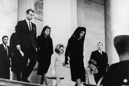 More like something out of a dream than a part of daily life, that weekend indelibly imprinted scenes in American memory: the riderless horse, the rat-a-tat-tat of the muffled drums, the brave widow, the toddler saluting his father’s casket.