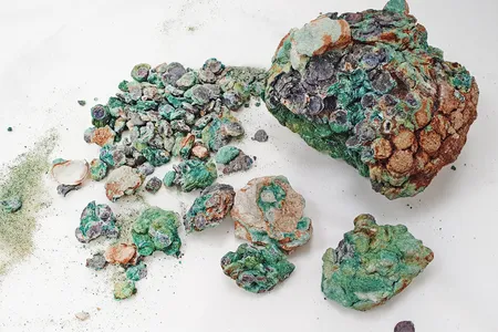 The metals oxidized over time, creating an enormous mass of coins.