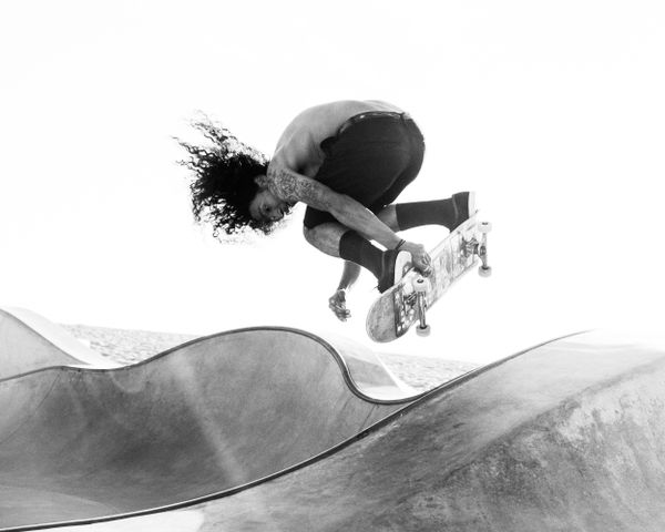 Skateboarder Grabbing Air thumbnail