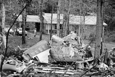 The wreckage of a Southern Airways DC-9 sits in the front yard of a home facing the road that the plane attempted an emergency landing on in New Hope, Ga., April 5, 1977. The pilot's attempt to save himself and his passengers occurred after the plane's engines failed during a heavy thunderstorm.