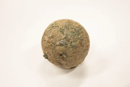 The intact cannonball weighs four pounds.