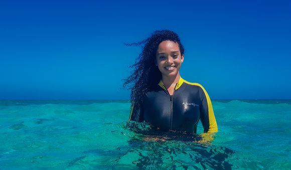 Pollard swimming near the Placencia Producers Cooperative farm where she sources her seaweed. Photo by Nick Perry, Coastline Studios