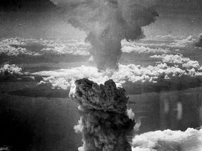 The mushroom cloud produced by the “Fat Man” bomb from the bombing of Nagasaki, Japan.