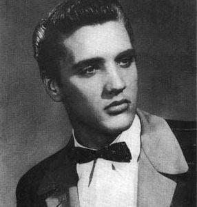 Presley in a Sun Records promotional photograph, 1954