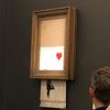 Watch This $1.4 Million Banksy Painting Shred Itself As Soon As It's Sold icon
