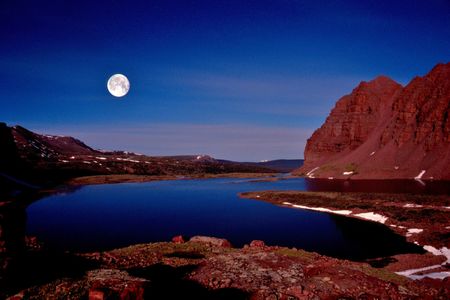 Moon glowing over Red Castle Lake, High Uintas Wilderness